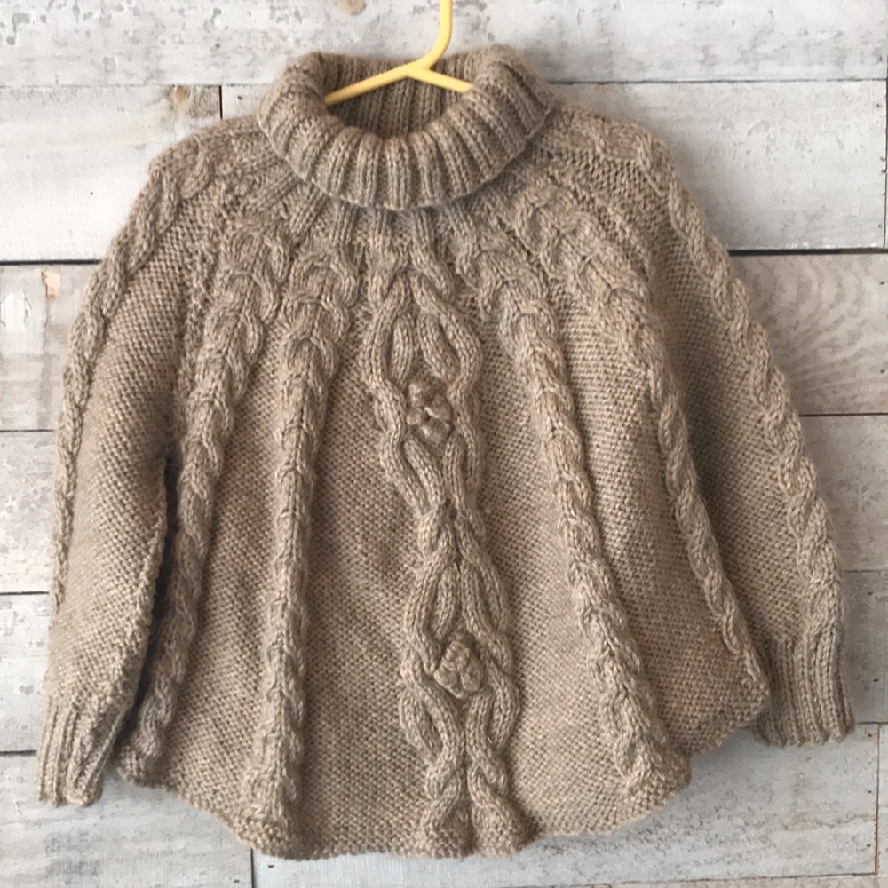 Superb merino cable knit bauble turtleneck sweater